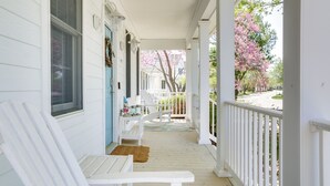 A porch with white railings, a bench, and a table with chairs. - 2 Mi to Beach: Ocean View Oasis w/ Resort Access! (Ocean View)