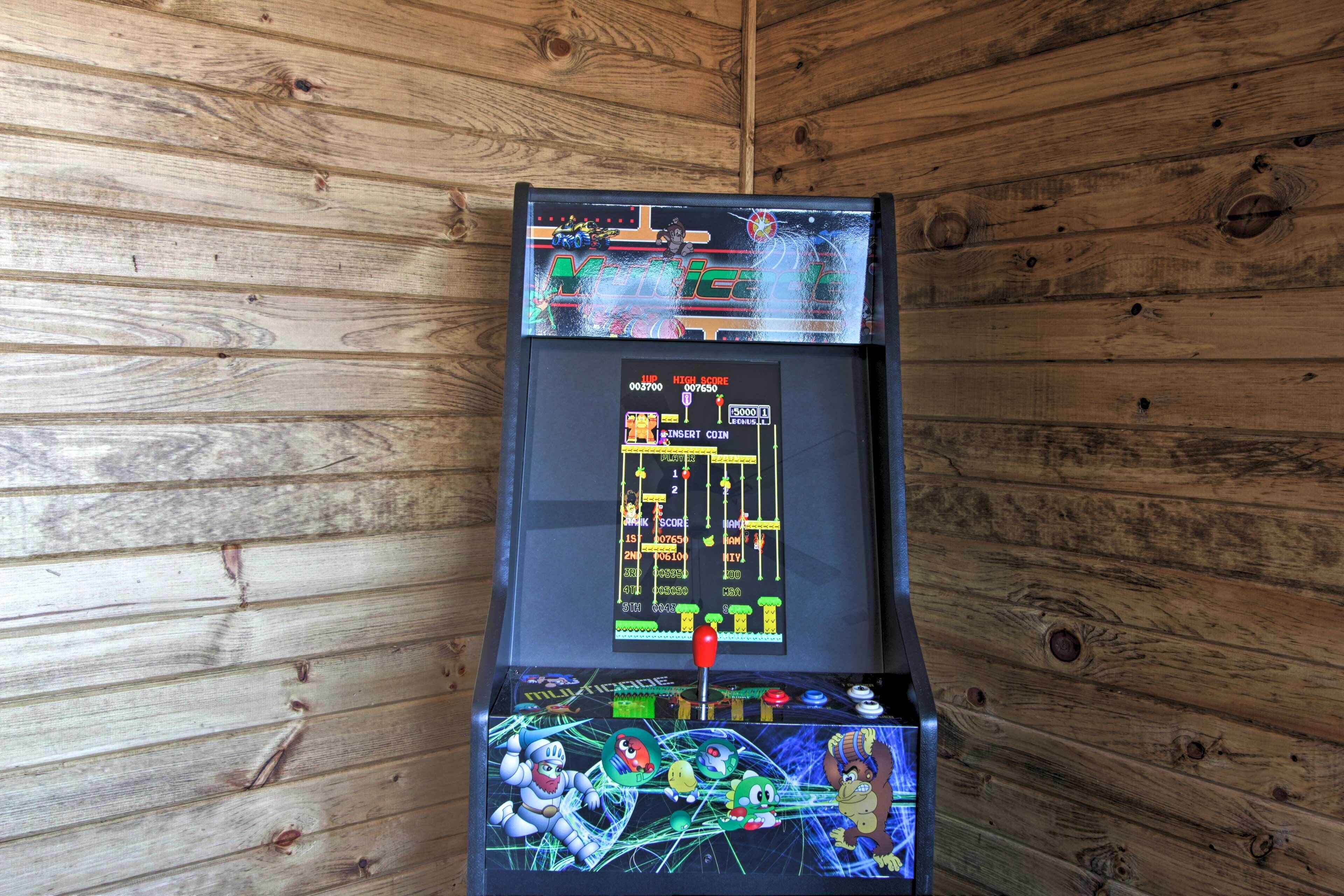 A pinball machine with a colorful design and a score display.
