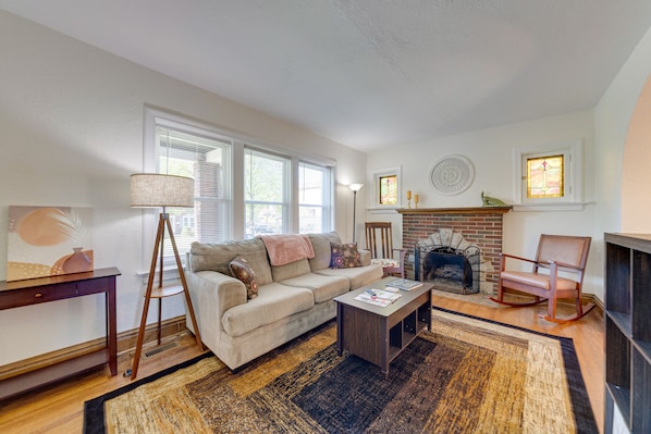 TV, fireplace, books