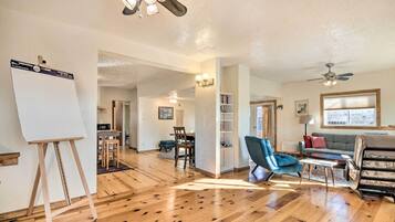 TV, fireplace, books