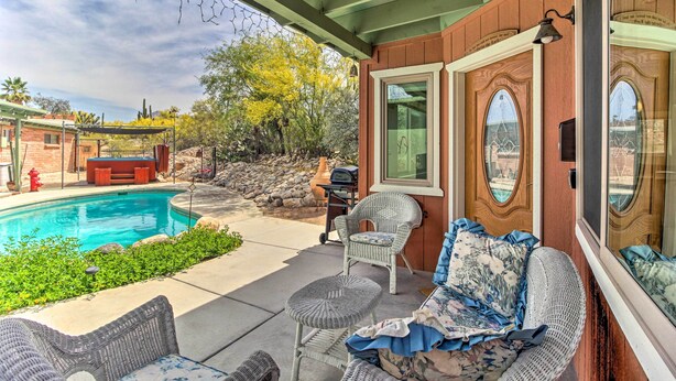 A covered patio with a pool, outdoor furniture, and a barbecue area. - Lovely Tucson Home w/ Private Pool & Hot Tub! (Tucson)