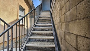 A concrete staircase with metal railings, leading to a building entrance. - 5 Mi to Universal Studios: Family Gem w/ Hot Tub! (Burbank)