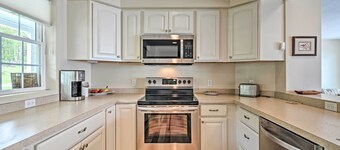 Lakefront De Tour Village Home w/ Deck & Fire Pit!