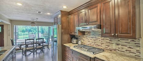 House (4 Bedrooms) | Private kitchen | Microwave, oven, stovetop, dishwasher