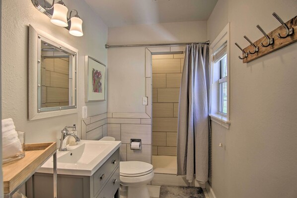 A bathroom with a sink, toilet, and shower. - Dock & Grand Lake Access! Idyllic Afton Getaway (Afton)