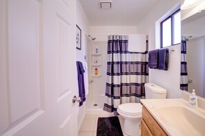 A bathroom with a shower, toilet, and sink. - 2 Mi to Whiskey Row: Tranquil Getaway w/ Deck! (Prescott)