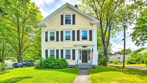 A two-story house with a front porch, a driveway, and a lawn. - Kennebunk Apartment w/ Local Beach Access! (Kennebunk)