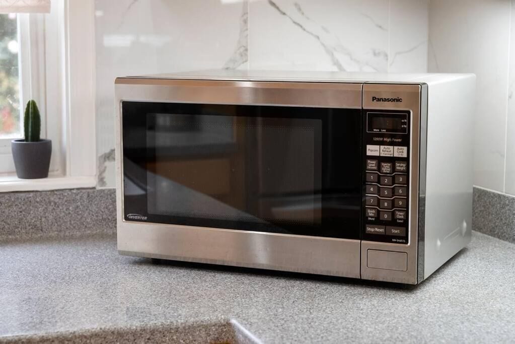 A Panasonic microwave oven on a kitchen counter.