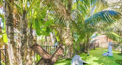 Tropical Oceanside Home w/ Deck, Walk to Beach