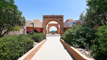 The entrance to the West Social Center with a clear pathway leading to the building.