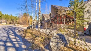 A building with a sign reading "CHIMNEY PIGG." - Walk to Lifts: 'chimney Ridge' Townhome w/ Hot Tub (Breckenridge)