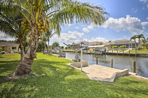 House (3 Bedrooms) | Front of property - Bright Home w/ Dock & Canal View in Cape Coral! (Cape Coral)