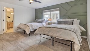 A bedroom with two beds, a ceiling fan, and a window with blinds. - Mtn-view Resort Condo, 5 Mi to Dtwn St George (St. George)
