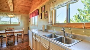Microwave, oven, stovetop, cookware/dishes/utensils - Ranch of the Rockies Cabin on 4 Acres w/ Mtn Views (Hartsel)