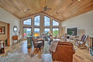 Fireplace, books - Spacious House w/ Wraparound Deck + Mtn Views! (Royal)