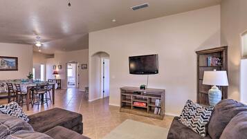 Flat-screen TV, fireplace, DVD player, books