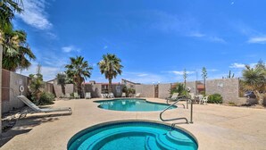 A swimming pool area with lounge chairs and a no swimming sign. - Peaceful Apache Junction Condo ~ 1 Mi to Downtown! (Apache Junction)