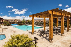 A pool area with a wooden pergola, lounge chairs, and a small pool. - Hot Tub, 2 Mi to Cabriolet Lift: Family Mtn Escape (Park City)