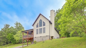 A two-story house with a balcony and a chimney. - Family Home w/ Views ~ 5 Mi to Downtown Asheville! (Asheville)