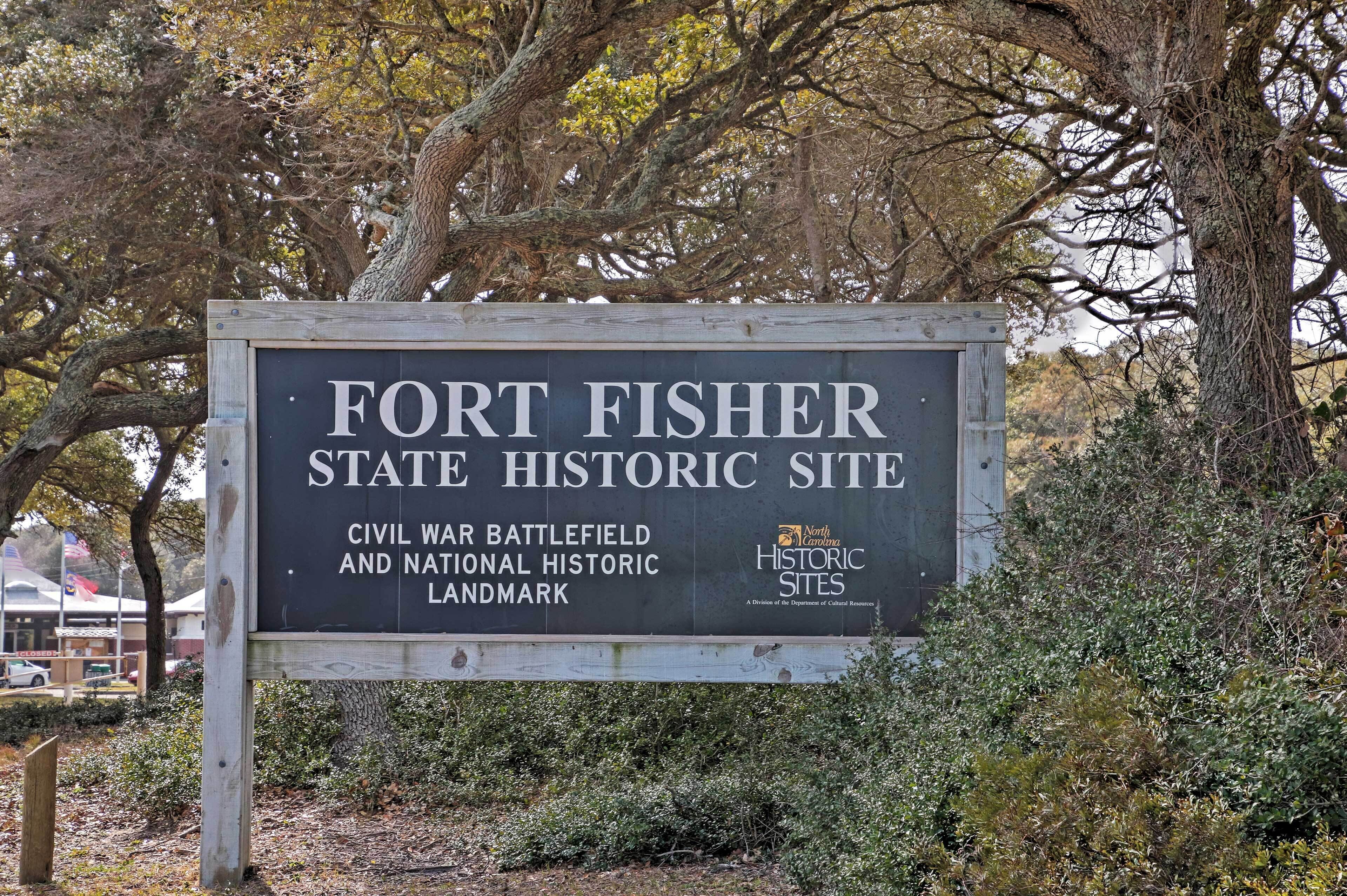 A sign for Fort Fisher State Historic Site, indicating it is a Civil War battlefield and National Historic Landmark.