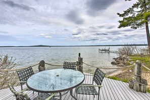 Outdoor dining - Dreamy Lake Skegemog Retreat: Boat, Ski & Sip! (Williamsburg)