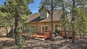 A house with a deck, a covered porch, and a grill area. - < 2 Mi to Hikes & Shops: Show Low Home w/ Deck (Show Low)