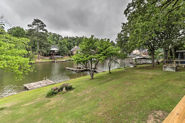 A lakeside property with a dock, grassy areas, and a small pavilion. - 7 Mi to Nat'l Park: Home w/ Dock in Hot Springs (Hot Springs)