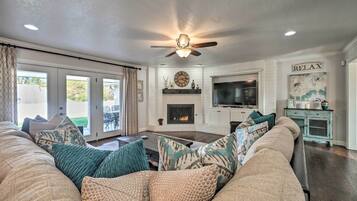 House (4 Bedrooms) | Living area | TV, fireplace