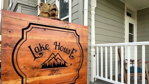 A wooden sign with the text "Lake House" and a mountain graphic, indicating a lodging establishment. - Charming Paris House ~ 1 1/2 Mi to Canyon! (Paris)