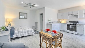 A modern apartment with a bedroom, kitchenette, and dining area. - Cozy Lompoc Studio w/ Patio ~ 9 Mi to Beach (Lompoc)