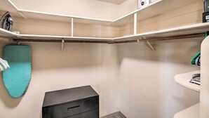 A corner closet with a teal storage basket, a black filing cabinet, and a white sink. - Lake Havasu City Home w/ Views: 3 Mi to Marina! (Lake Havasu City)