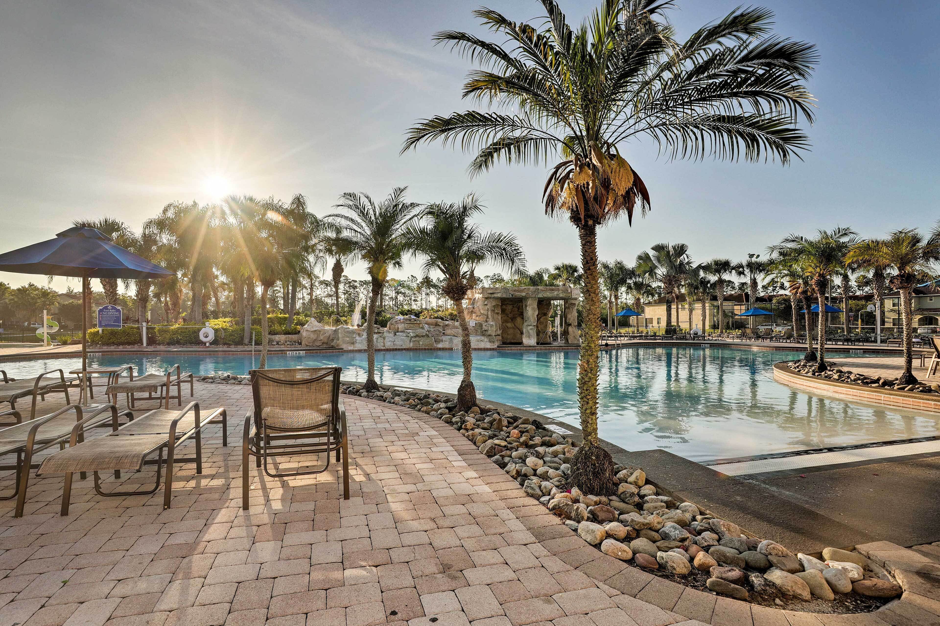 A poolside area with lounge chairs and a clear view of the pool.