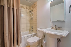 A bathroom with a bathtub, toilet, and sink. - Pet-friendly Malta Home Near Hunting Areas! (Malta)