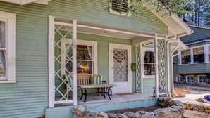 A house with a porch, stone steps, and a bench. - Historic Prescott Home w/ Yard & Fire Pit! (Prescott)