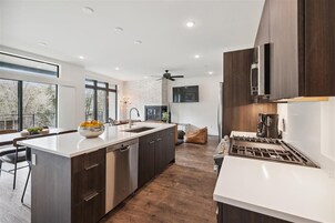 Condo, 2 Bedrooms | Private kitchen | Fridge, oven, coffee/tea maker, toaster
