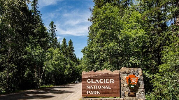 A sign for Glacier National Park. - Hungry Horse Cabin: 11 Mi to Glacier National Park (Hungry Horse)