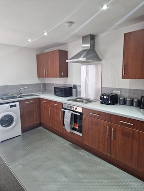 Apartment | Private kitchen | Fridge, microwave, oven, stovetop