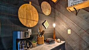 A kitchen with a coffee maker, wooden cutting board, and a sign about mushrooms. - Country-chic Waxhaw Studio w/ Pool Access! (Waxhaw)