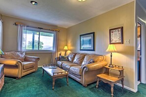 TV, fireplace, books - Secluded Mountain Home w/ Stunning Views & Deck! (Bryson City)