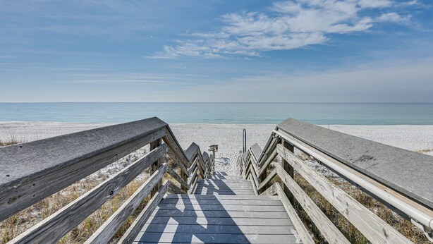 A wooden boardwalk leading to a beach with a clear sky. - 2.5 Blocks to Beach! Miramar Tropical Cabana' (Miramar Beach)