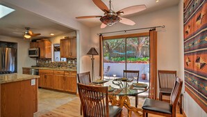 A spacious kitchen with wooden cabinets, a built-in microwave, and a large island. - Patio & Views: Peaceful Sedona Getaway! (Sedona)