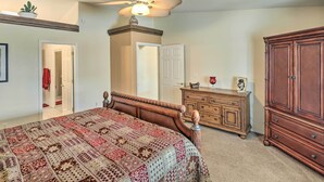 A bedroom with a bed, dresser, and wardrobe. - Arizona Retreat w/ Casita ~ 2 Mi to Lake Havasu (Lake Havasu City)