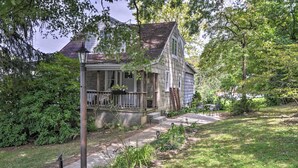 A two-story house with a porch, surrounded by lush greenery and a well-maintained lawn. - Enchanting Family House w/ Balcony < 3 Mi to Wvu! (Morgantown)
