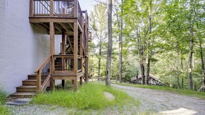 A wooden staircase leading to a deck with a view of a forest. - 2 Decks, Mountain View: Beech Mountain Cabin! (Banner Elk)