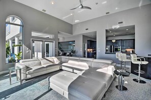 TV, fireplace, books - Stunning Home w/ Heated Pool & River Access! (Ormond Beach)