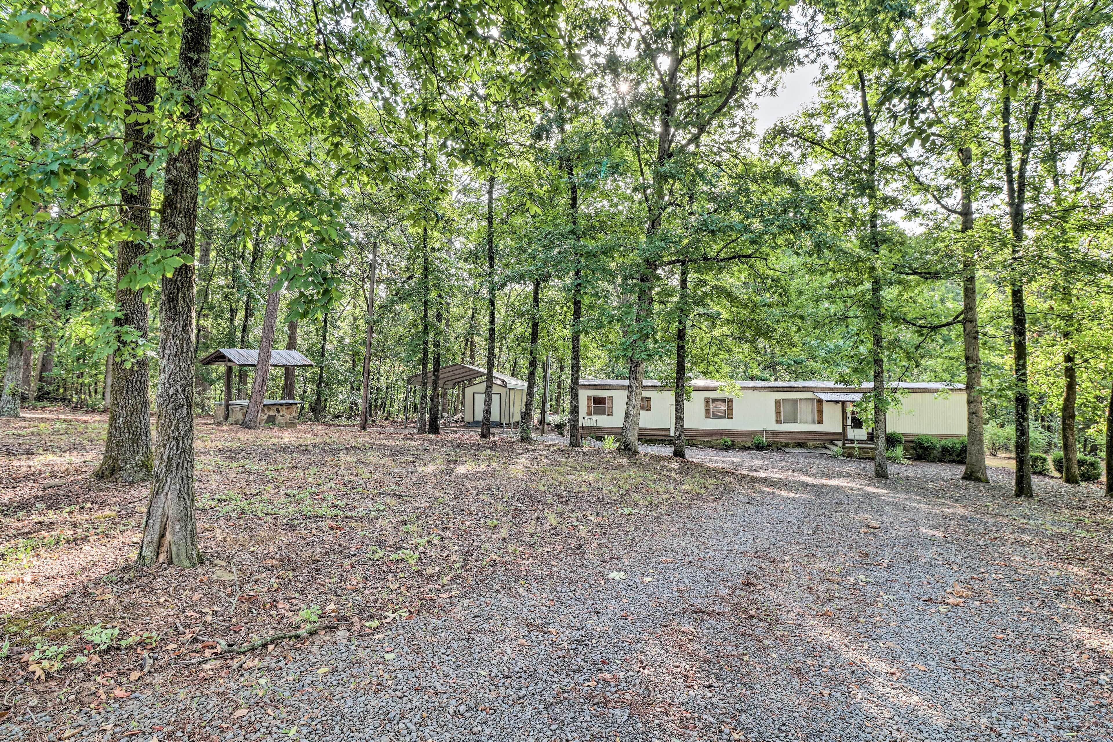 A campground with RVs and a cabin.