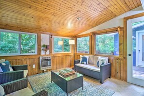 TV, fireplace, books