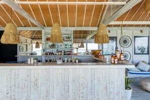 Enjoy a casual drink at the bar, where you can relax and socialize in a welcoming atmosphere.