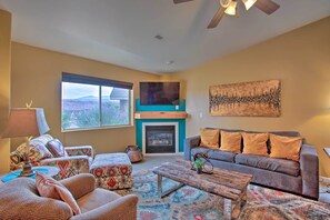 Fireplace, books - Modern Moab Townhome With Shared Pool & Hot Tub! (Moab)