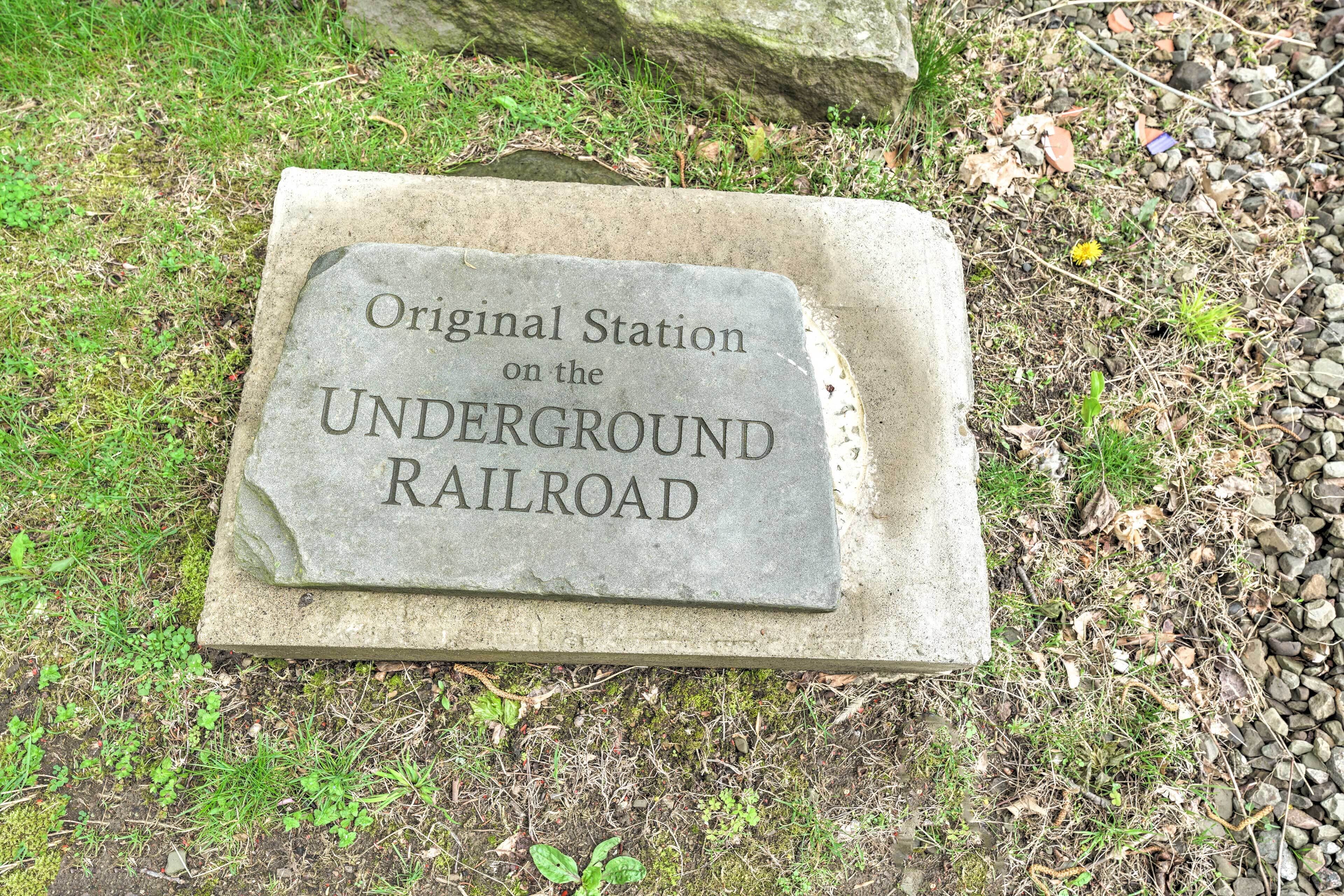 A stone plaque with the inscription "Original Station on the Underground Railroad."